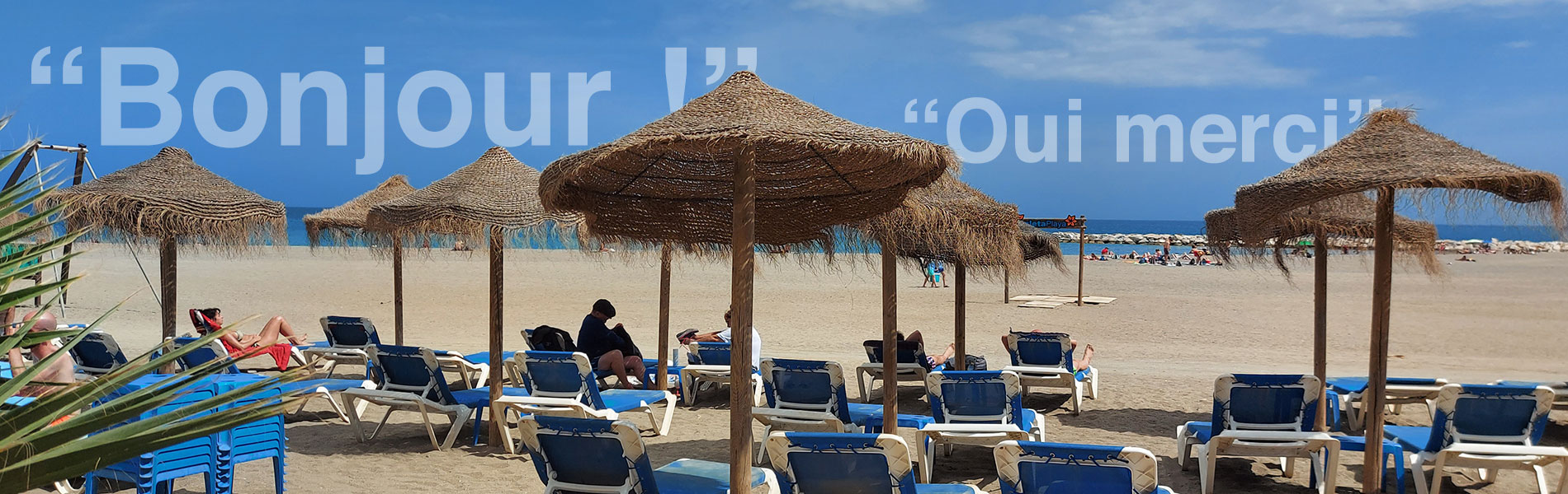 francophones sur une plage d'Espagne